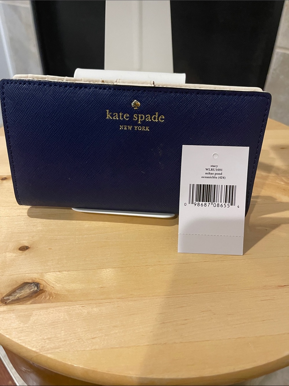 kate spade navy saffiano leather continental wallet with gold logo